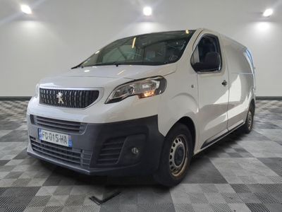 a picture of a white van parked in a garage