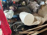 a cluttered room with a lot of clutter on the floor