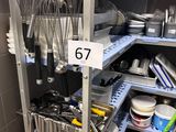 a shelf with a lot of kitchen utensils on it