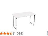 a white folding table with four stars on top of it