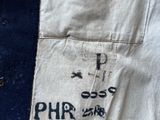 someone is holding a piece of cloth with writing on it that says phi phi phi phi phi phi phi phi phi phi phi phi phi phi phi phi phi phi phi