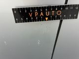 a picture of a close up of a measuring tape on a car