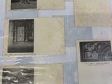 an old photo of a collection of old photographs on a table