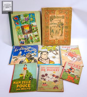 plusieurs livres pour enfants sont alignés sur une surface blanche
