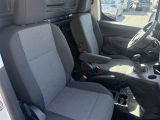 two seats in the back of a van with a cup holder