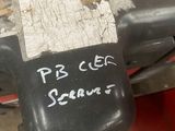 a piece of metal with writing on it sitting on a table