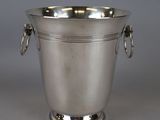 an antique silver plated ice bucket with handles and handles