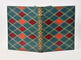 a blue and red plaid book with a red and green cover