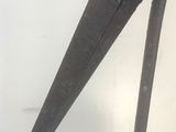 a large metal object with a long beak on it