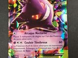 gros plan d'une carte pokemon sur une table
