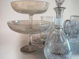 a lot of glass items that are on a table
