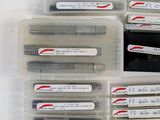 a lot of different types of staples in a box