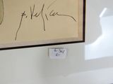 une photo d'une photo représentant une personne sur laquelle figure un nom