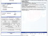 a close up of a document with a barcode on it