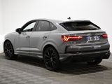 the rear end of a silver audi q4