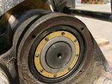 a close up of a metal object with a bearing on it