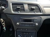 a car dashboard with a steering wheel and a key in it