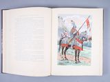 an open book with a picture of a man on a horse