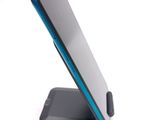 a cell phone that is sitting on a stand