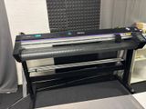 an image of a large ploter printer sitting on top of a table