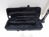a black case that has a clarinet inside of it