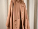 an image of a brown cape on a mannequin mannequin mannequin mannequin mannequin mannequin mannequin mannequin