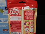 a bag of chips sitting next to a package of chips