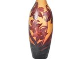 a vase with a floral design on it on a white background