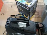 an image of a box of power tools sitting on top of a cardboard box