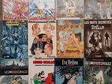 a lot of comic books that are on the table