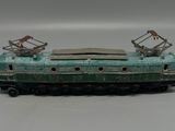 a toy train that is sitting on a white surface