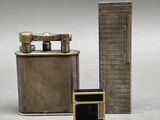 two lighters sitting next to each other on a table