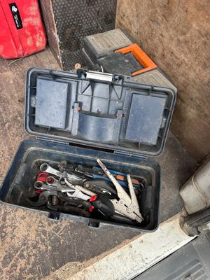 a tool box with tools in it on the floor