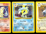 Quatre cartes Pokémon différentes sont représentées en ligne sur un fond noir.