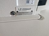 a close up of a sewing machine with a label on it