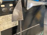 a machine that is working on a piece of metal