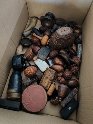 a cardboard box filled with different types of objects