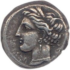 une pièce d'argent portant une tête de femme