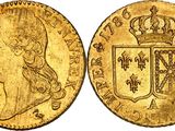 a gold sovereign coin with a crown on top of it