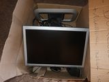 a television sitting in a cardboard box on the floor