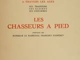 an old french book with a red title on it
