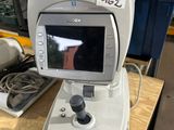 an image of a microscope with a monitor on top of it
