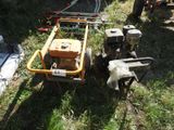 a small machine that is sitting in the grass