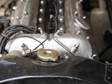a close up view of a car engine with the hood up
