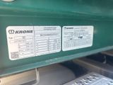 a close up of a green machine with a label on it