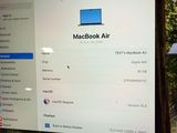 a computer screen with the macbook air logo on it