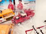 two boxed toys that include a school bus, a school bus, and a school bus