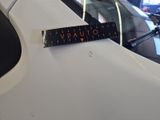 a sticker on the hood of a car that says vauto