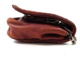 leather wallet with zipper open on a white background