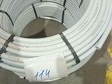 a large coil of white wires on the floor